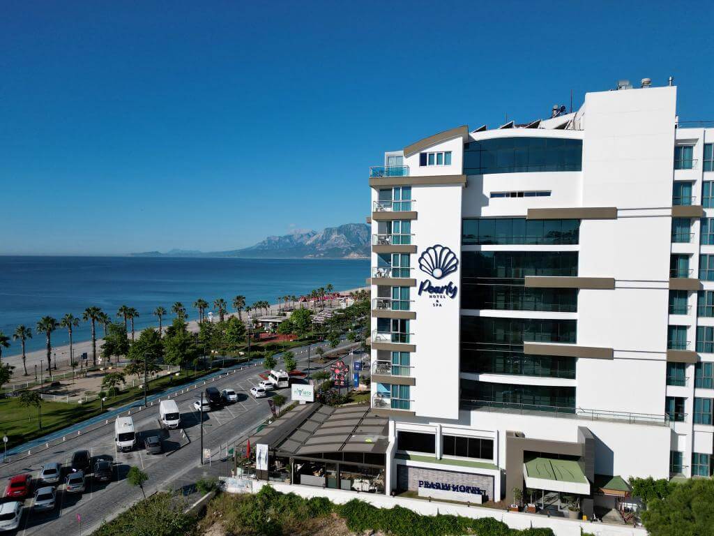 PEARLY HOTEL logo